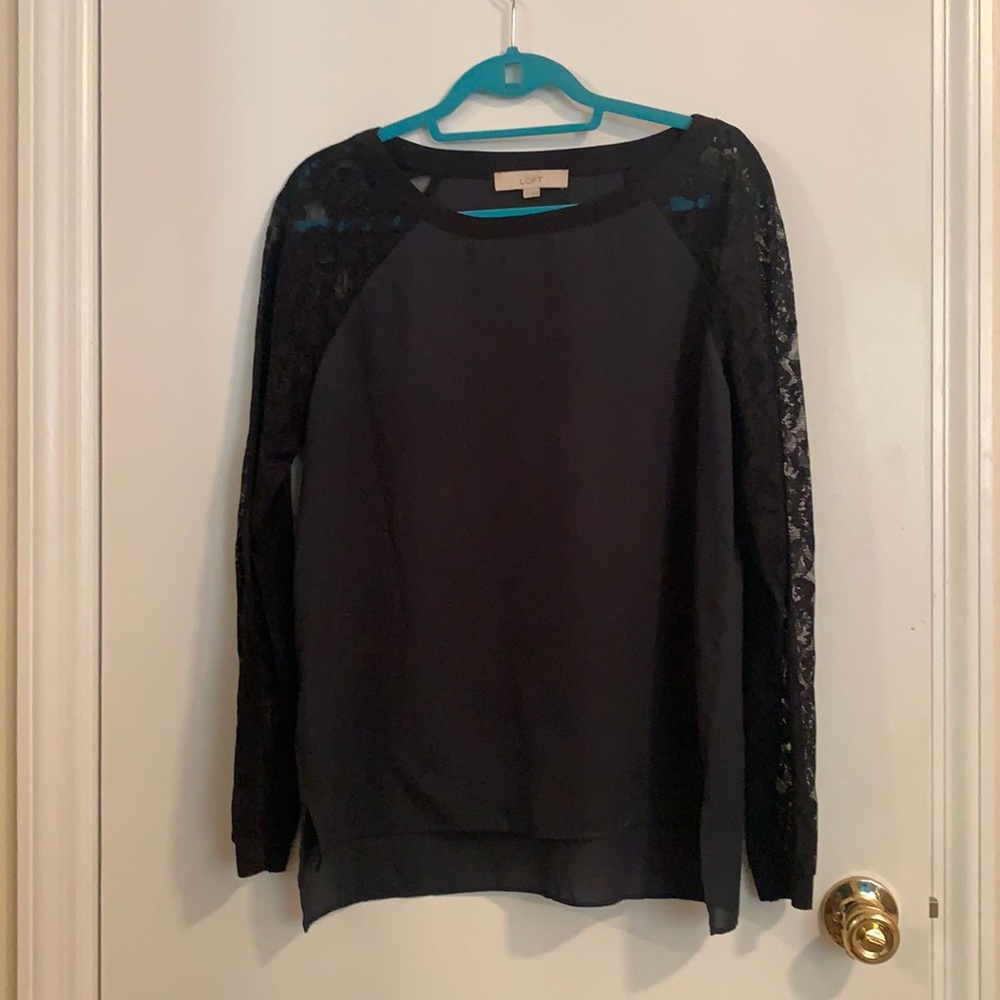 Green blouse with black lace sleeves